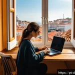 Home 21 디지털 노마드를 위한 해외 세금 가이드 - A professional digital nomad working on a sleek laptop in a cozy Lisbon apartment, large windows sho...